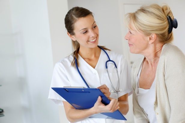 two individuals smile knowing they have medicare supplement