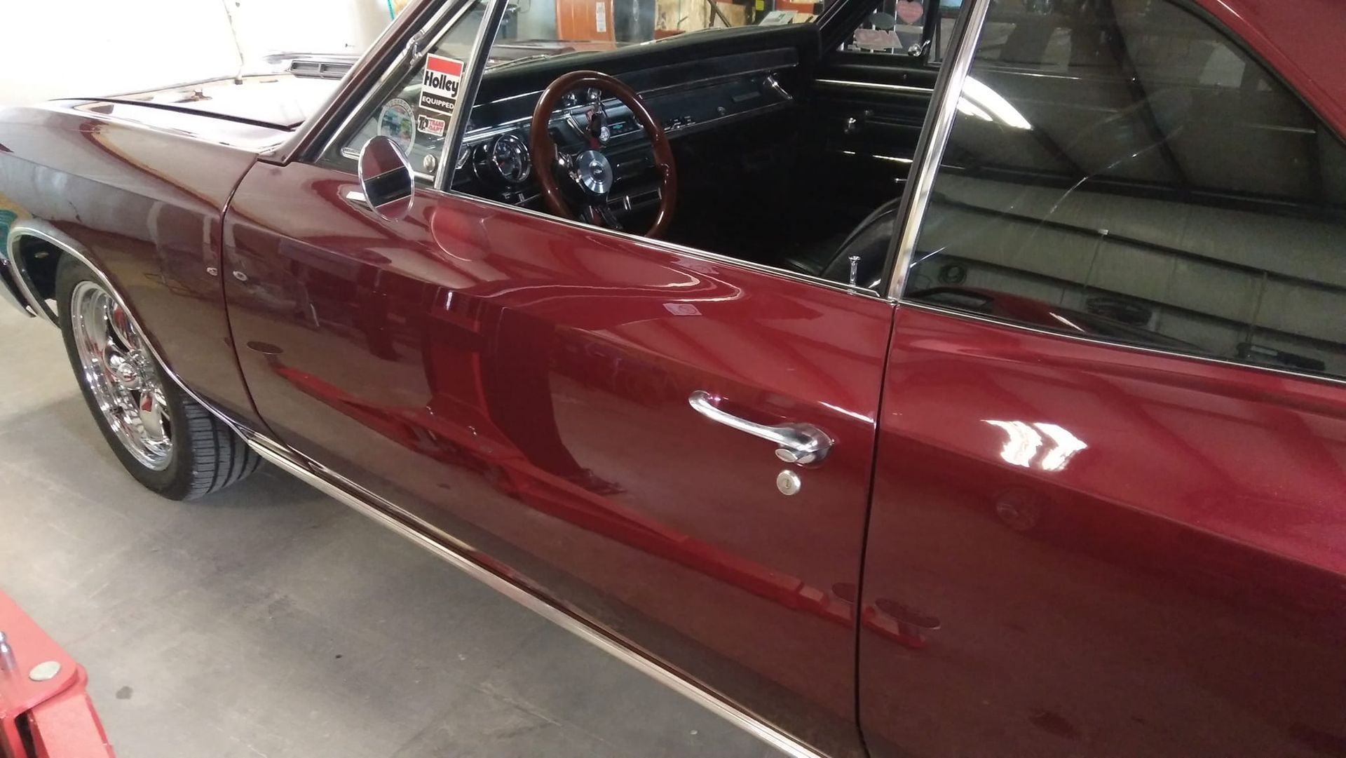 side profile of red vintage car 