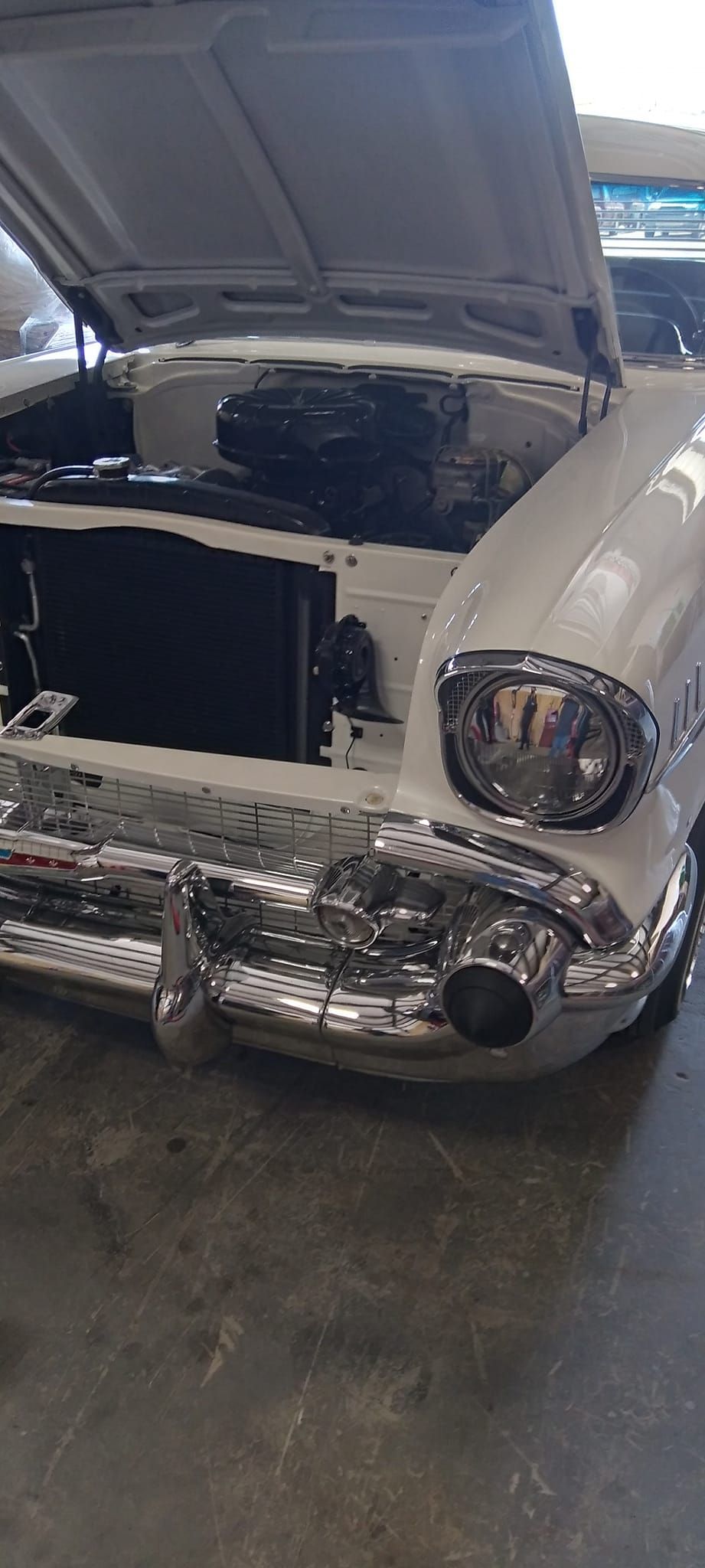 close up of headlights and hood of vintage car