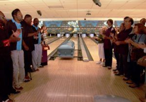 People at the bowling alley saying goodbye to loved one at Torres Cremation and Burial Services CA