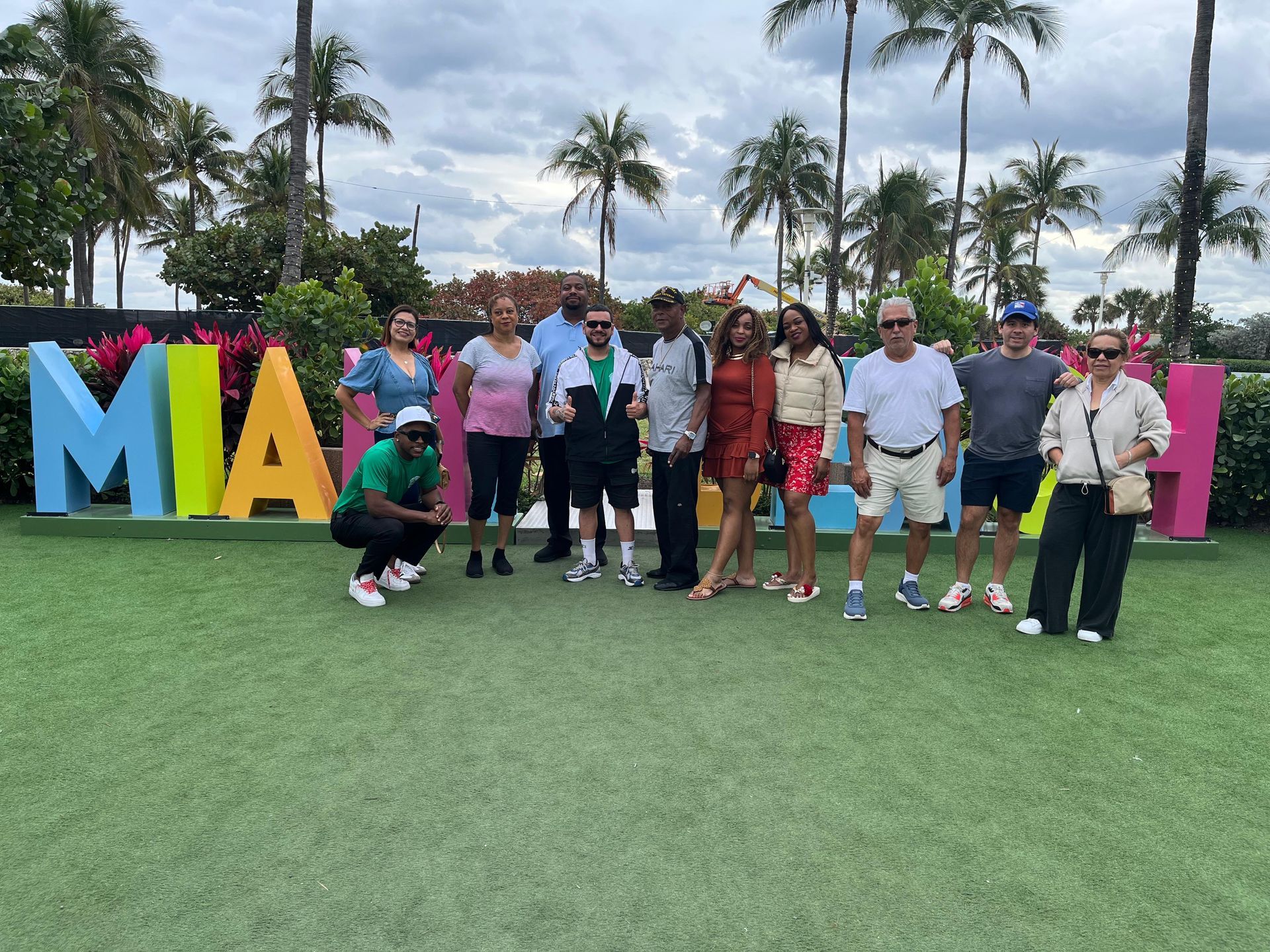Passengers in the Miami Beach sign in Ocean Drive 