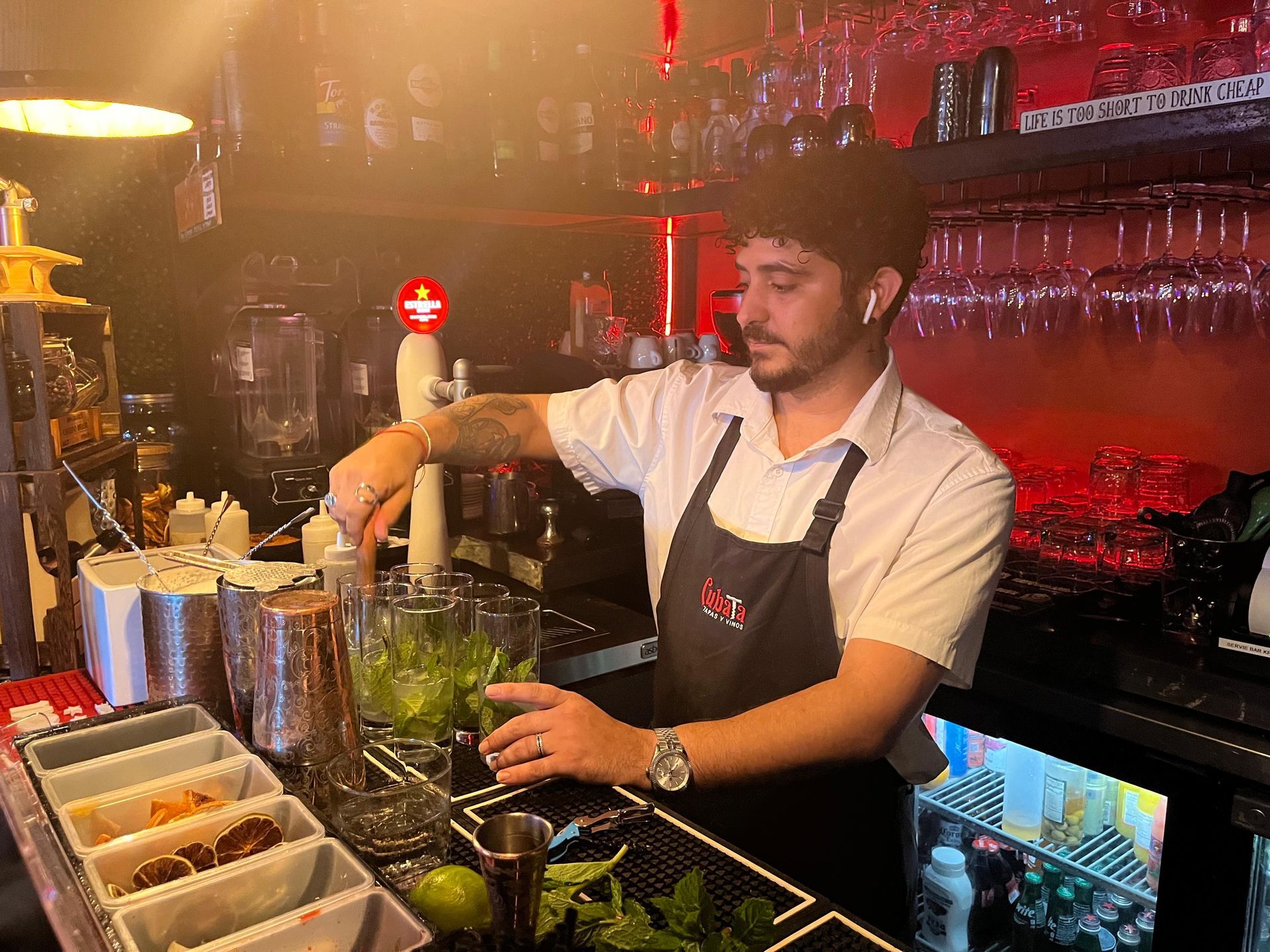 Bartender making the free Mojitos in the Miami Sunset & City Lights tour in little Havana