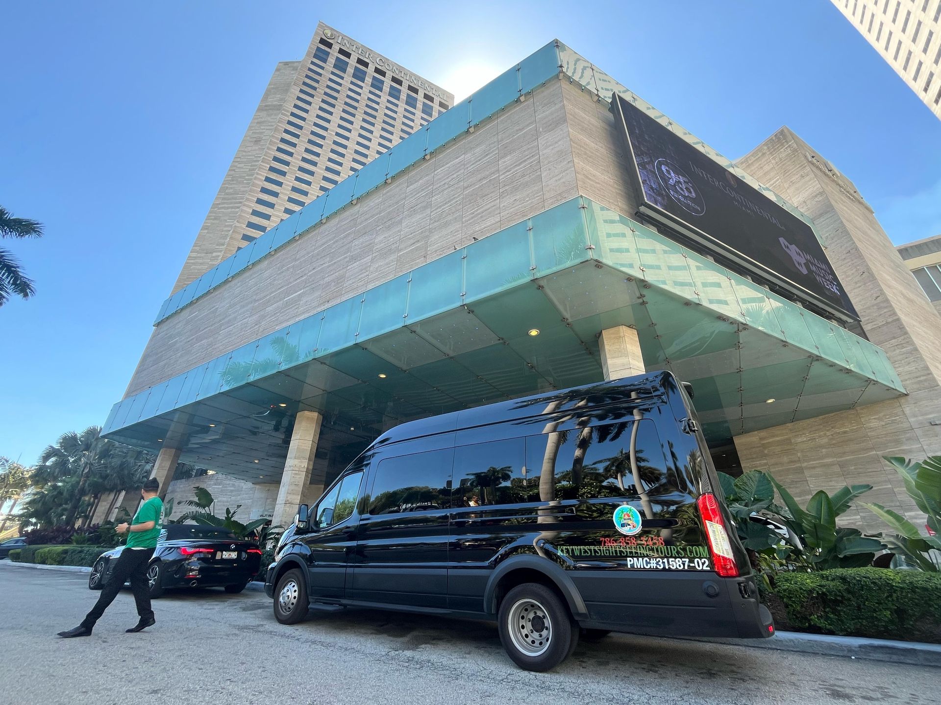 Miami bus tour hop on hop off parked in a hotel in downtown Miami