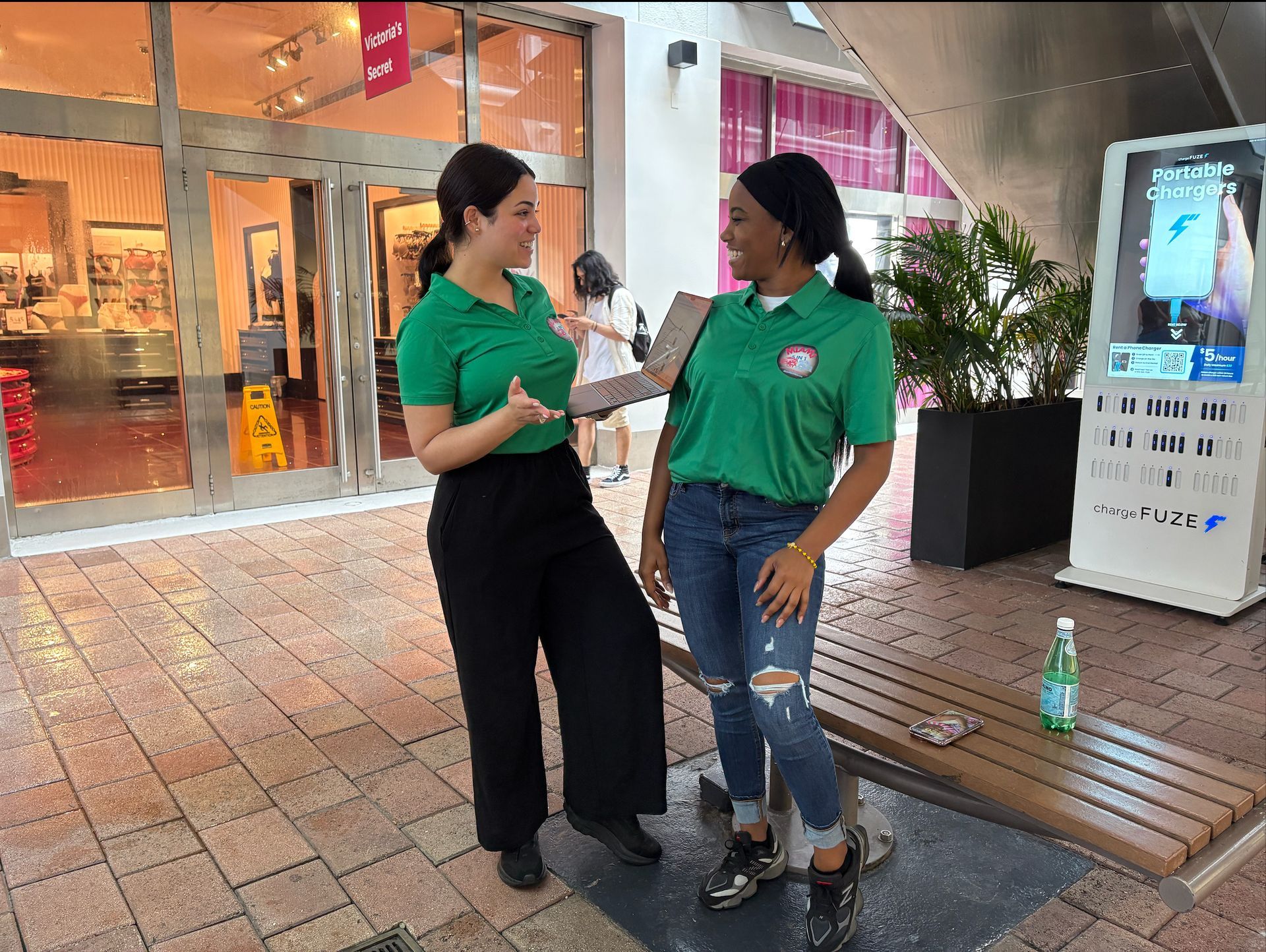 Yoli and Aleli in the Bayside Hop on Hop off Sightseeing Office