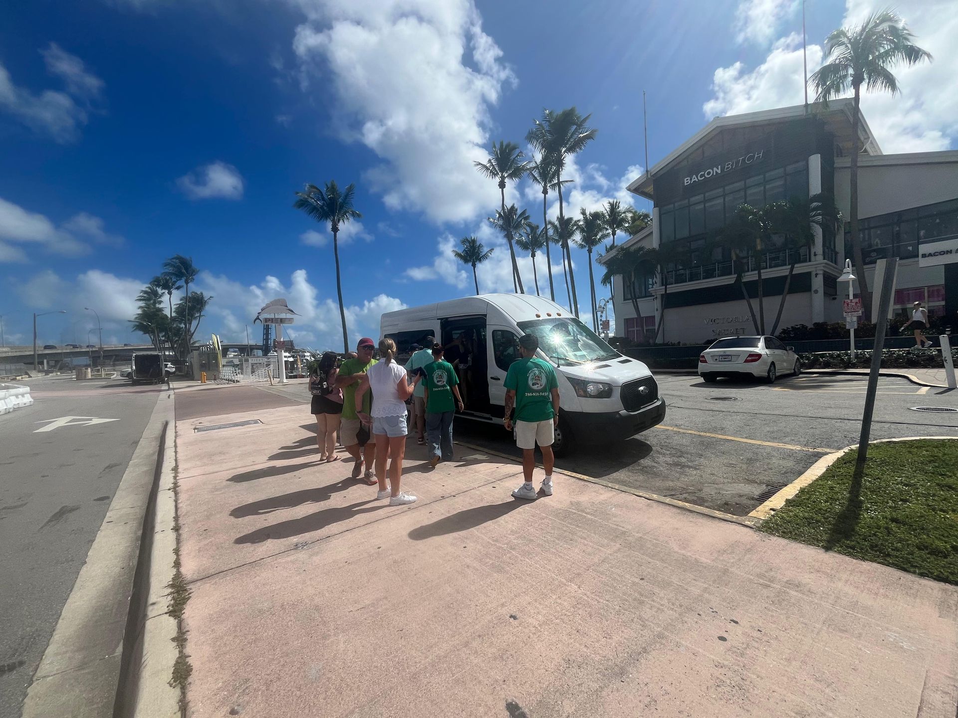 Passengers boarding the Semi private hop on Hop off City tour in Miami from Bayside 