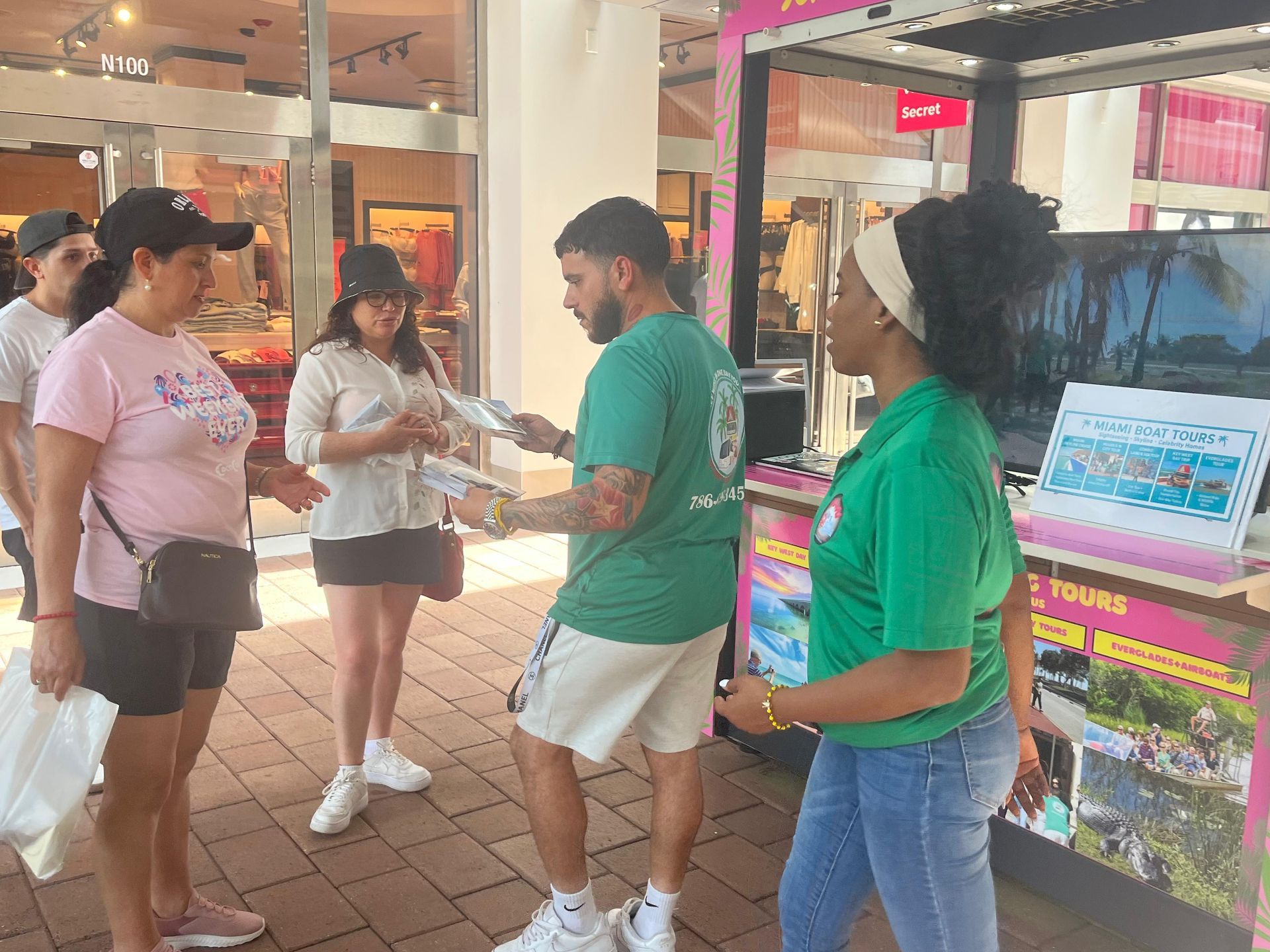 Alex the manager giving out the Souvenir photo package 