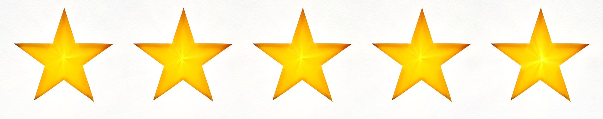 a row of five yellow stars on a white background .