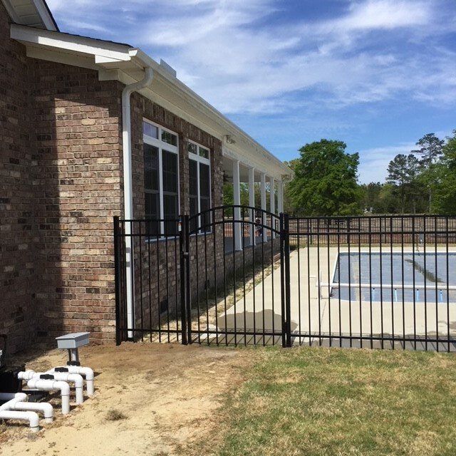 Iron Pool Area Fence — Raeford, NC — Professional Fence Company