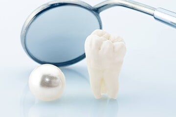 Healthy Tooth with a Pearl - Implant Surgery in New Bedford, MA