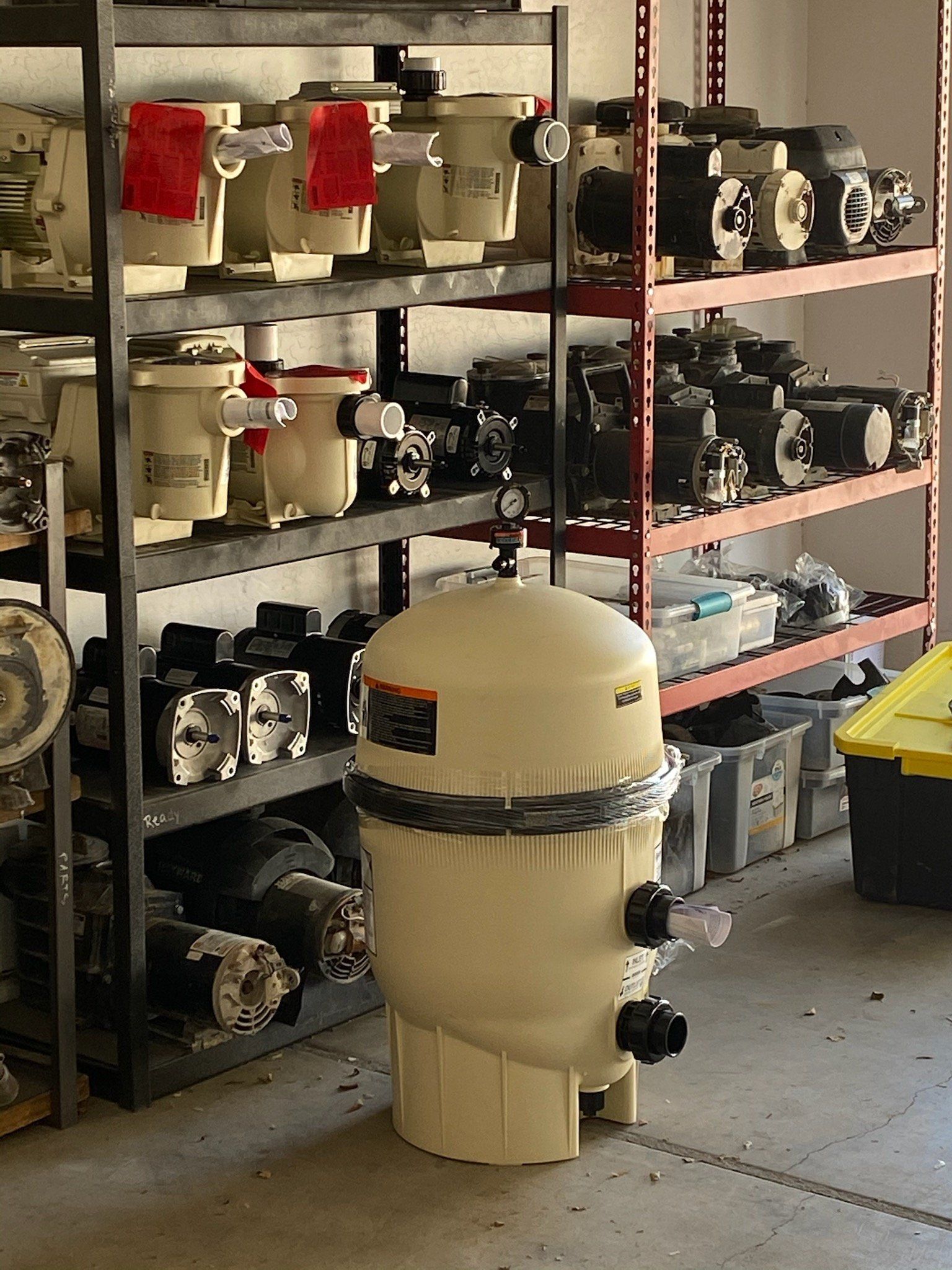 A warehouse filled with lots of swimming pool equipment