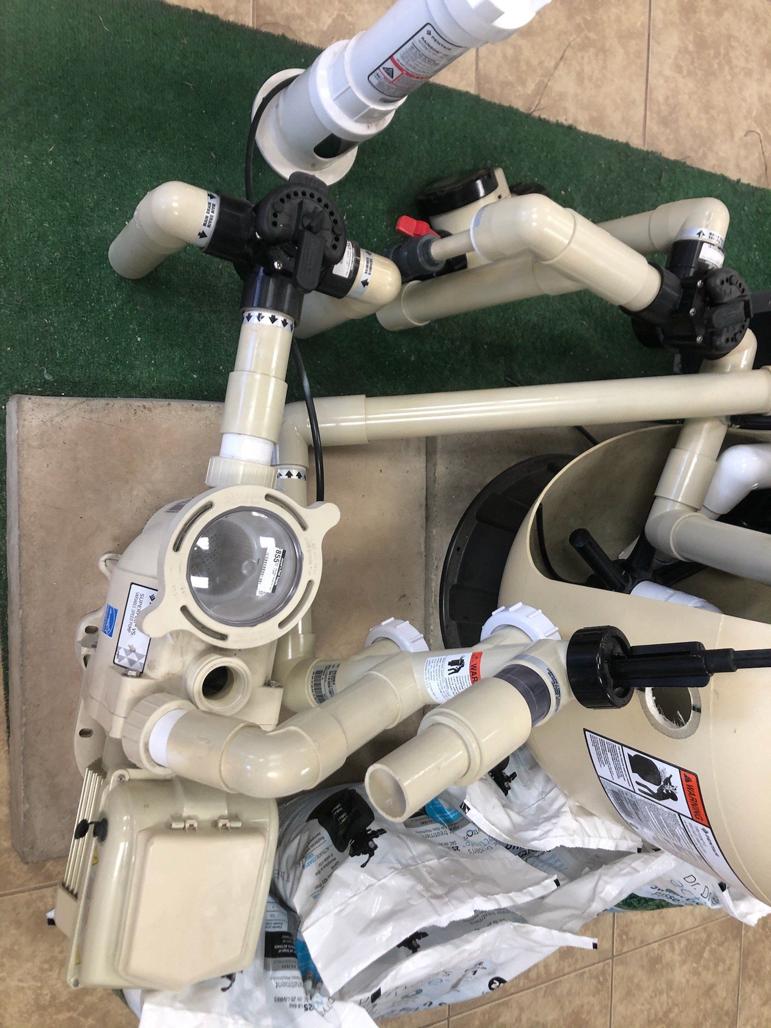 A bunch of pipes are sitting on top of a table.