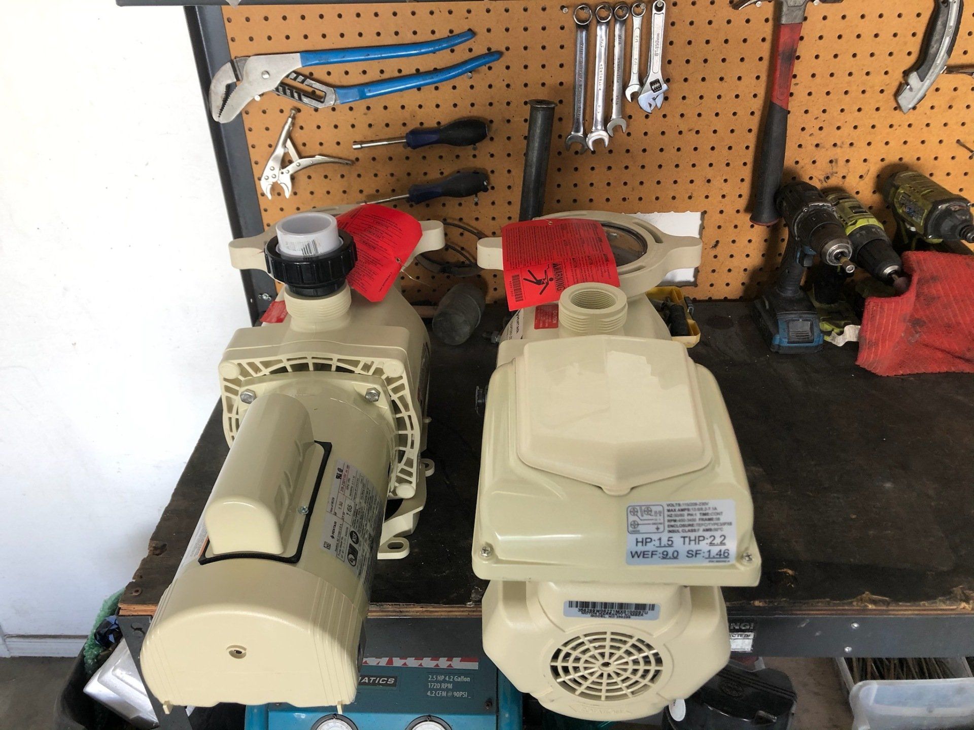Two pumps are sitting on a table next to each other
