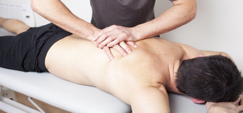 Treating Spine pain at In Touch with Health Osteopaths
