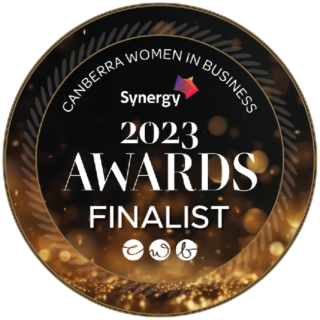 Canberra Women in Business 2023 Awards Finalist badge. Black and gold, with Synergy logo and CWB initials.