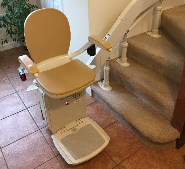 Hinged rail curved stairlift in Congleton, Cheshire. Helping Hand Stairlifts.