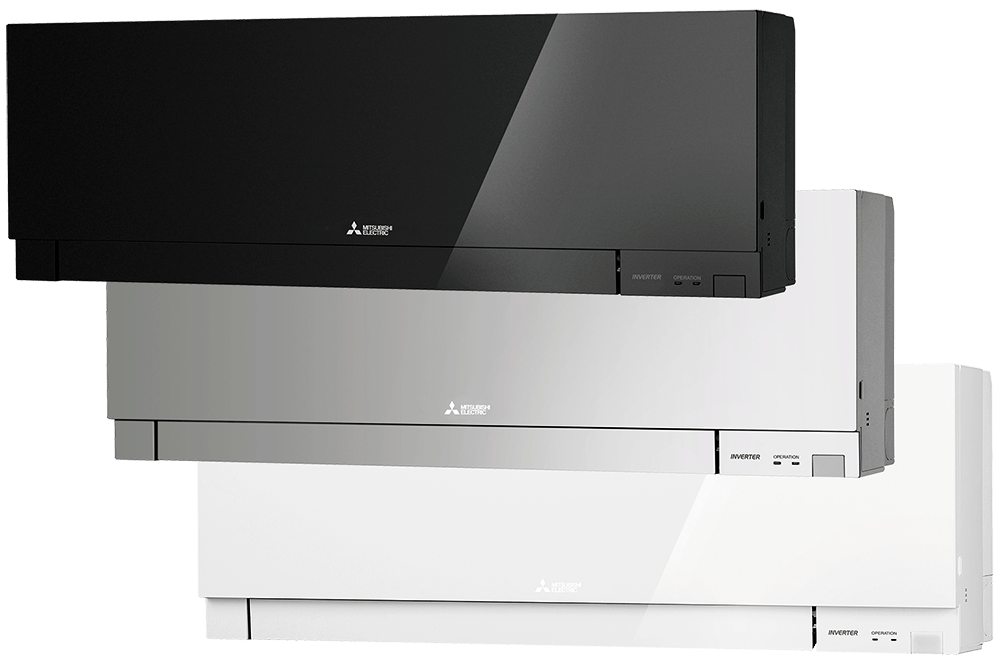 Three Mitsubishi air conditioning units in black, silver, and white, mounted on a wall.