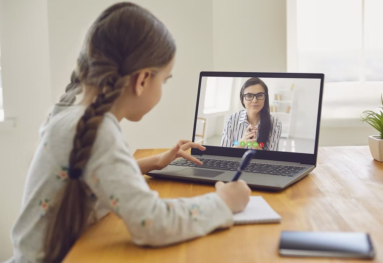 A Woman Is Giving A Presentation To A Group Of People — RIP IT UP Reading in Maitland, NSW