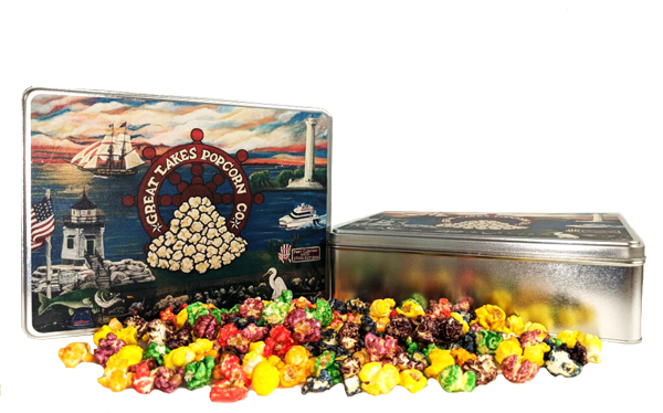 A tin of popcorn featuring iconic Port Clinton, OH landmarks and a sample of gourmet popcorn available at Great Lakes Popcorn Co.