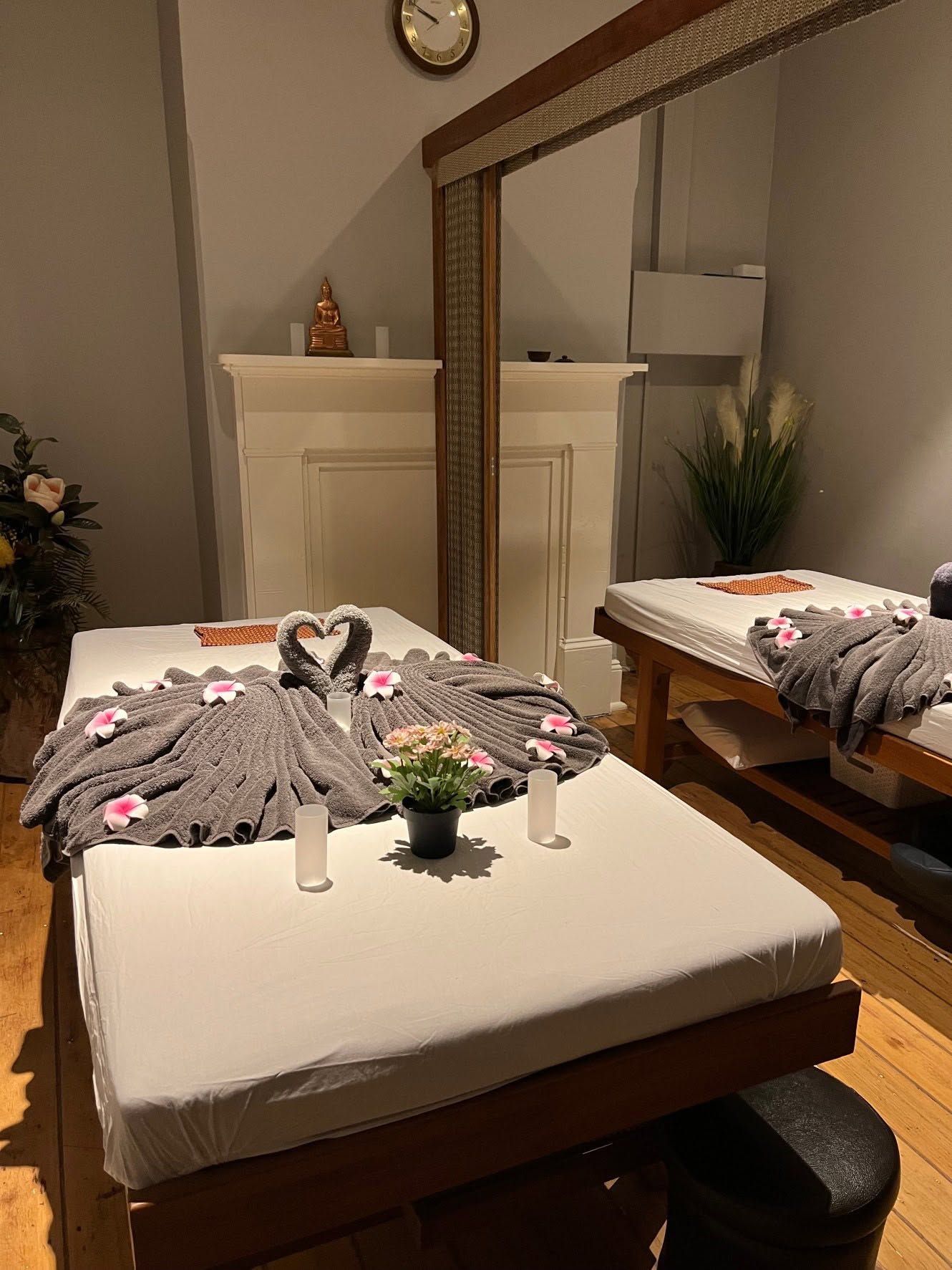 Spa Massage Table with Folded Towels — Thai Massage In Bathurst, NSW