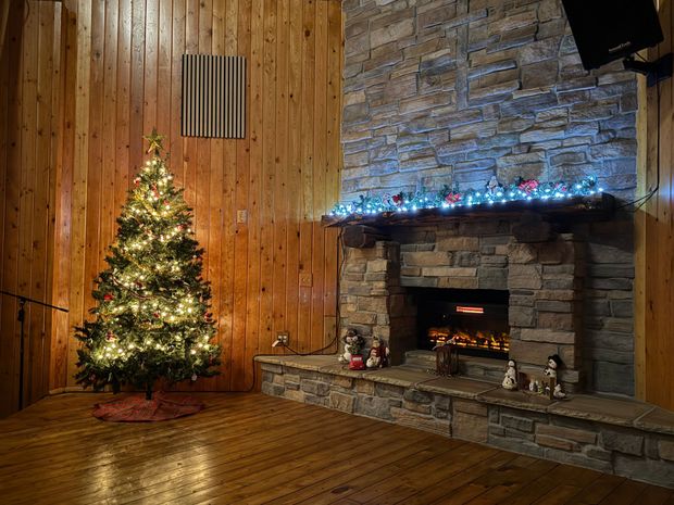A plate of food with eggs , beans and toast on a table.