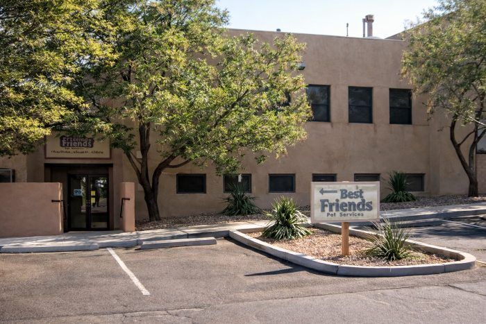 Best Friends exterior for Bernalillo, NM pet cremation with entry sign, trees, and parking area