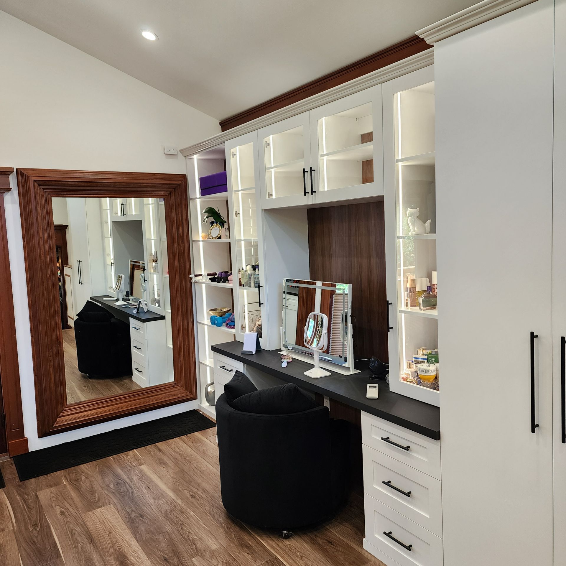 There is a large mirror in the middle of the room.