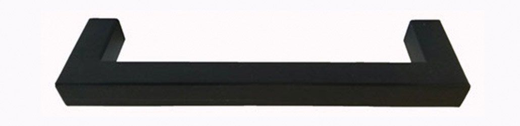 A black object is sitting on a white surface.