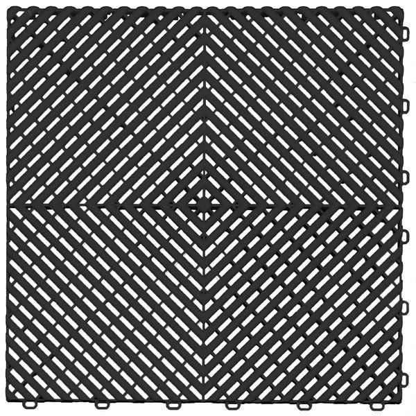 A black and white tile with a geometric pattern on it.