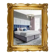 Gold ornate frame displaying a hotel bedroom: bed, patterned wallpaper, window with curtains.