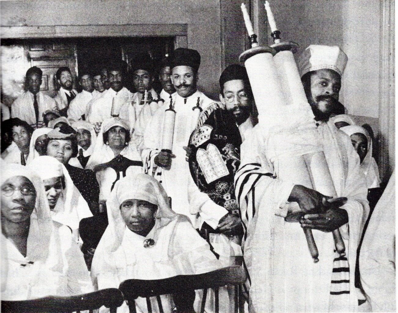 A black and white photo of a group of people the Black Israelites of Harlem