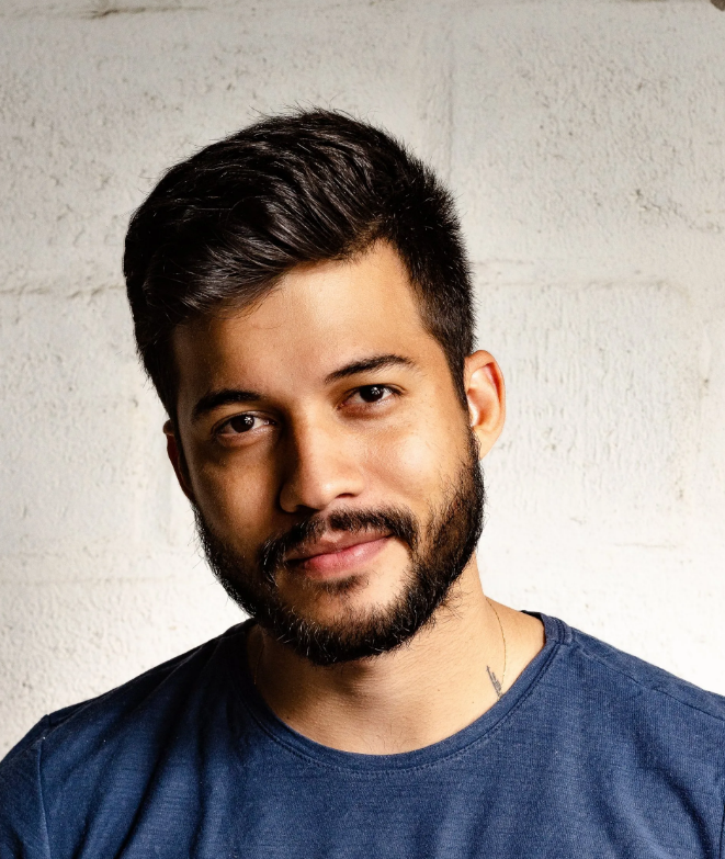 A picture of an Asian male with a full beard