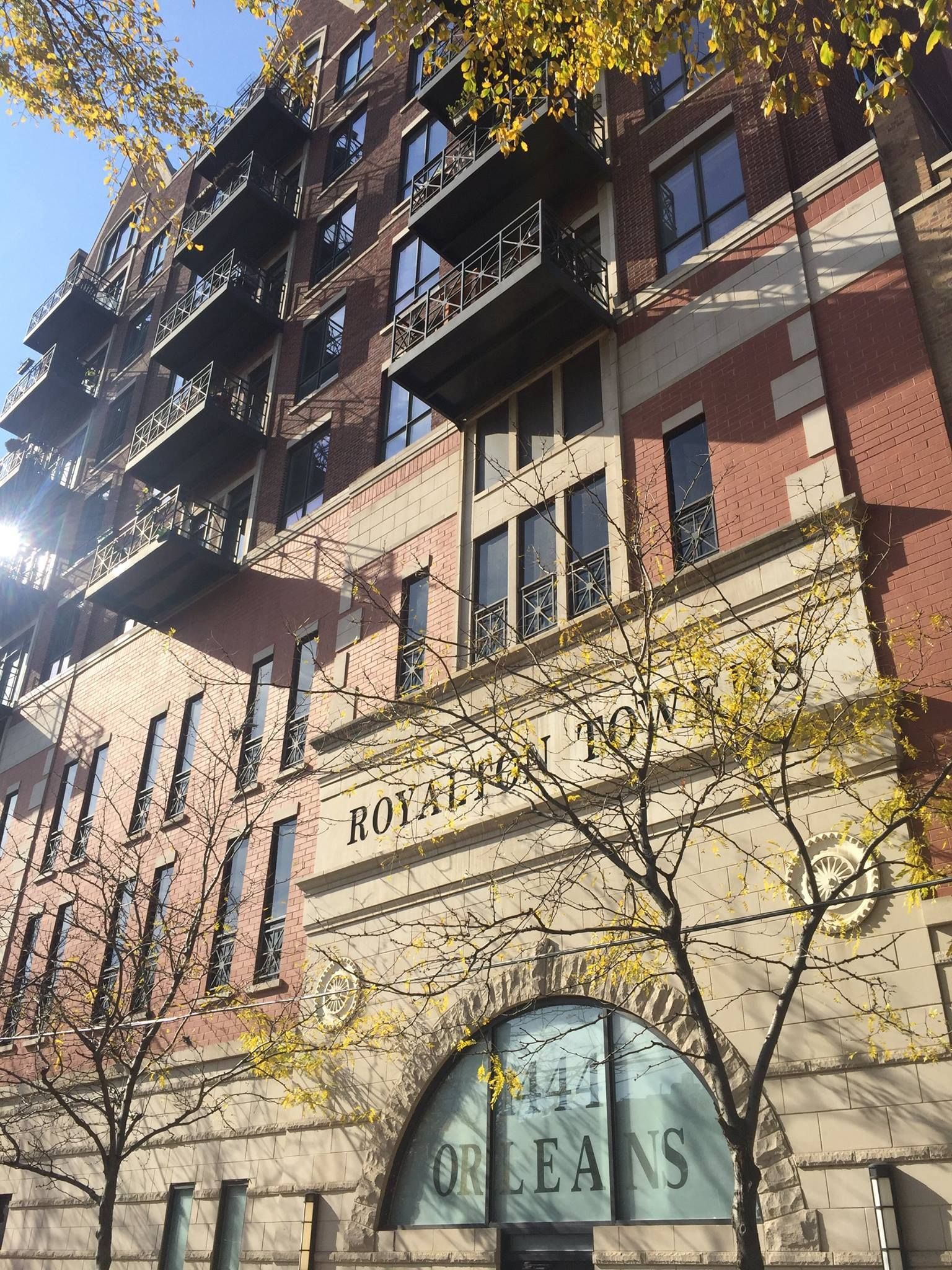 A large brick building with a sign that says ' hotel orleans ' on it