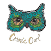 Teal owl mask with swirling patterns; brown eyes, nose, and 