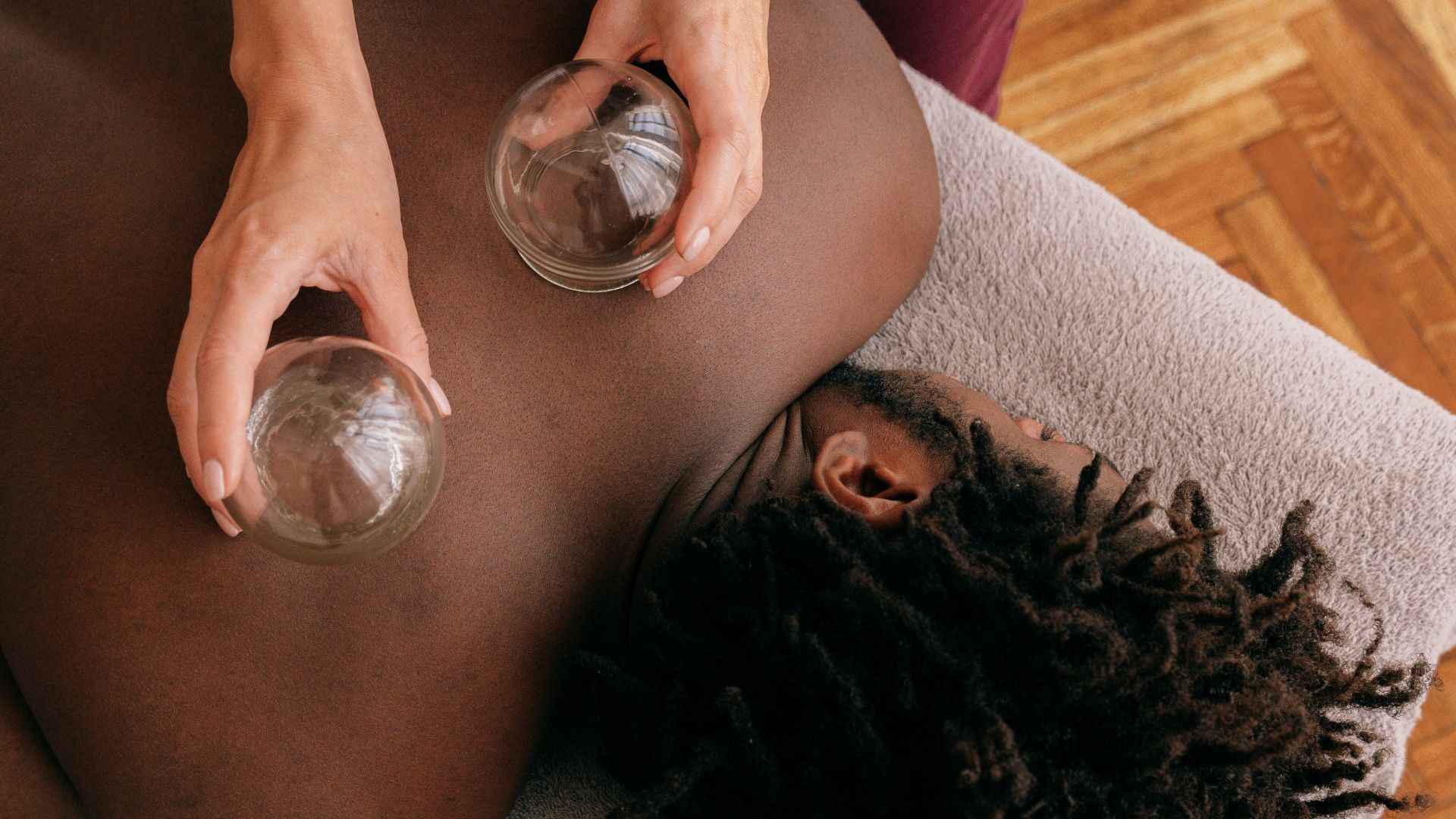 a man is getting a cupping treatment on his back
