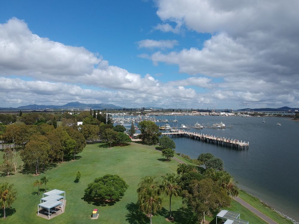 An Aerial View Of A Park Next To A Body Of Water  — Armstrong Removals in Gladstone, QLD