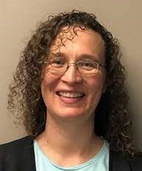 A light gray, stylized icon of a human head and shoulders centered on a white background.