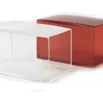 Two rectangular acrylic risers: one clear and one translucent red, nested partially together on a white background.