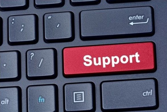 New Westminster computer repair support icon on a black computer keyboard