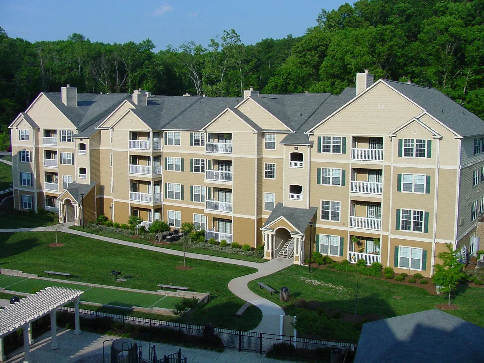 A large apartment building with lots of windows and balconies