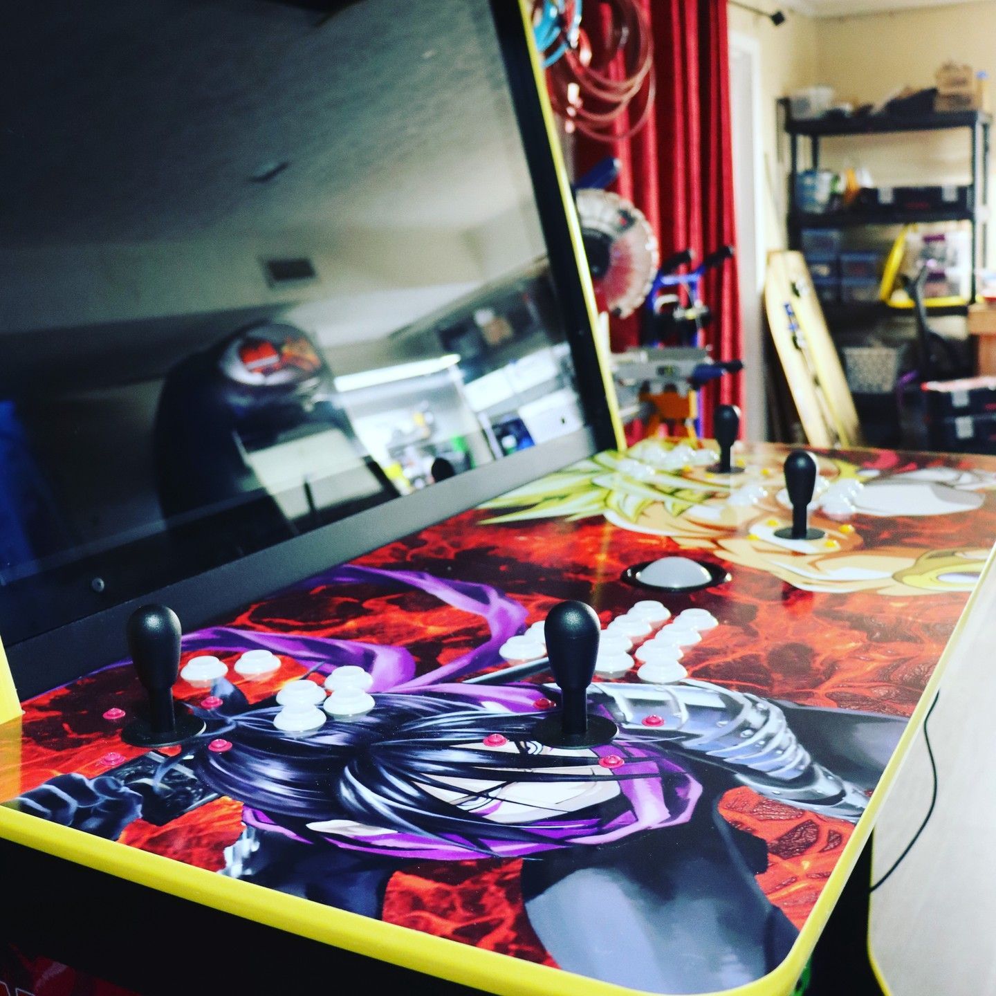 G&G Arcade Custom Cabinets | an arcade machine with a girl on the screen