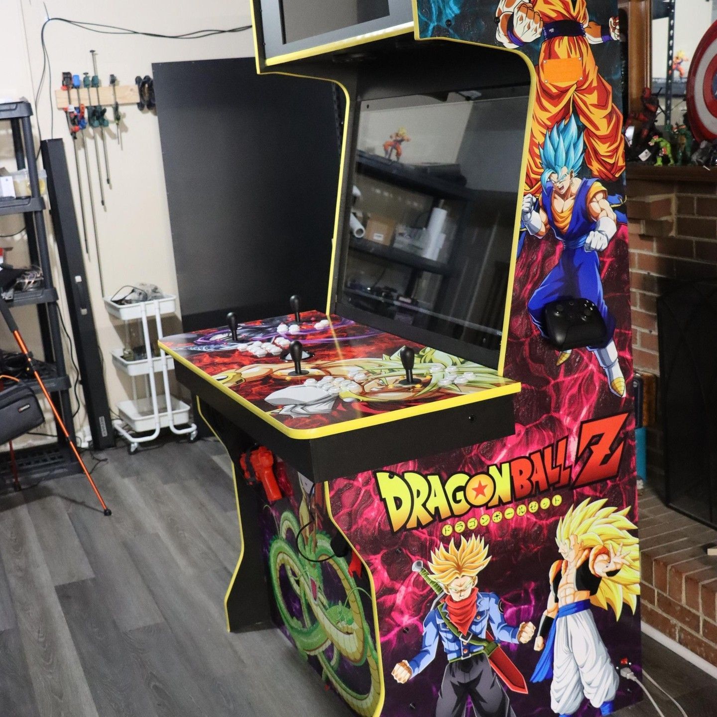G&G Arcade Custom Cabinets | a dragon ball z arcade machine in a living room