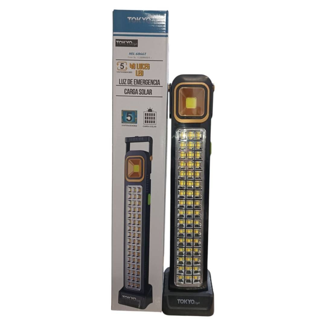Luz de trabajo LED negra y dorada con caja, que muestra un diseño y características de estilo linterna.