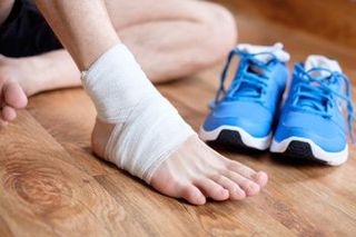 Ankle Sprains — Feet With Bandage in Orlando, FL