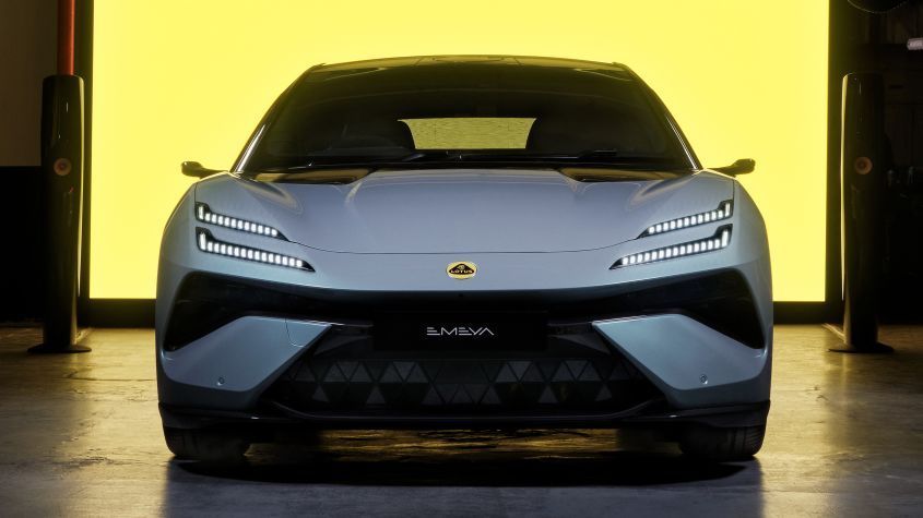 Photo of a Lotus Emeya with a yellow lit background