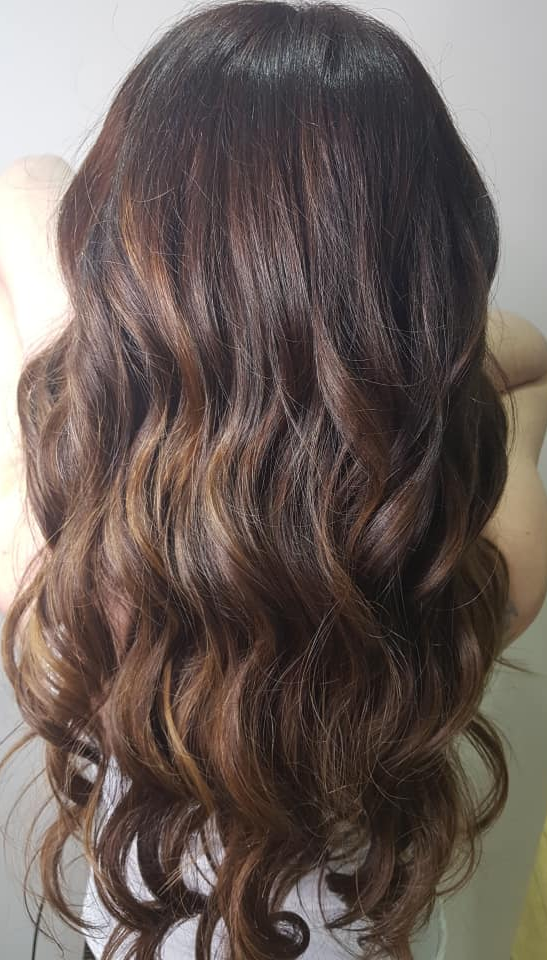 curled brunette hair