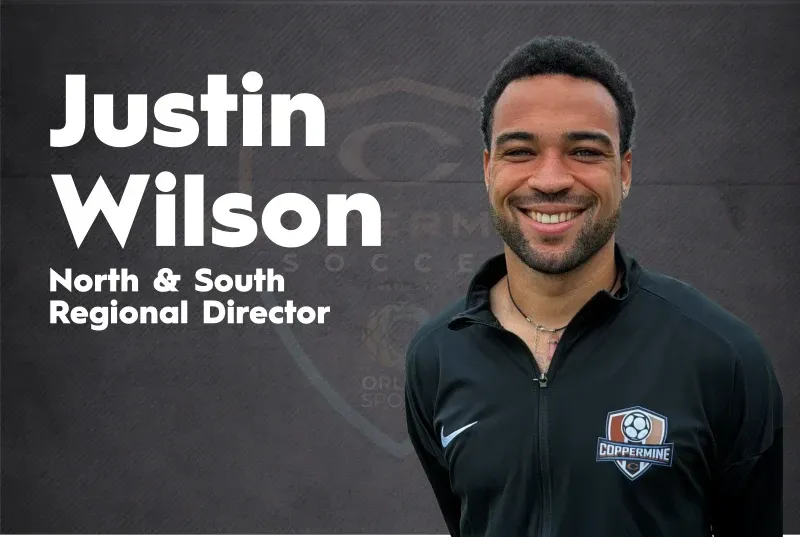 Justin Wilson smiling in a black shirt, labeled North & South Regional Director on a gray background