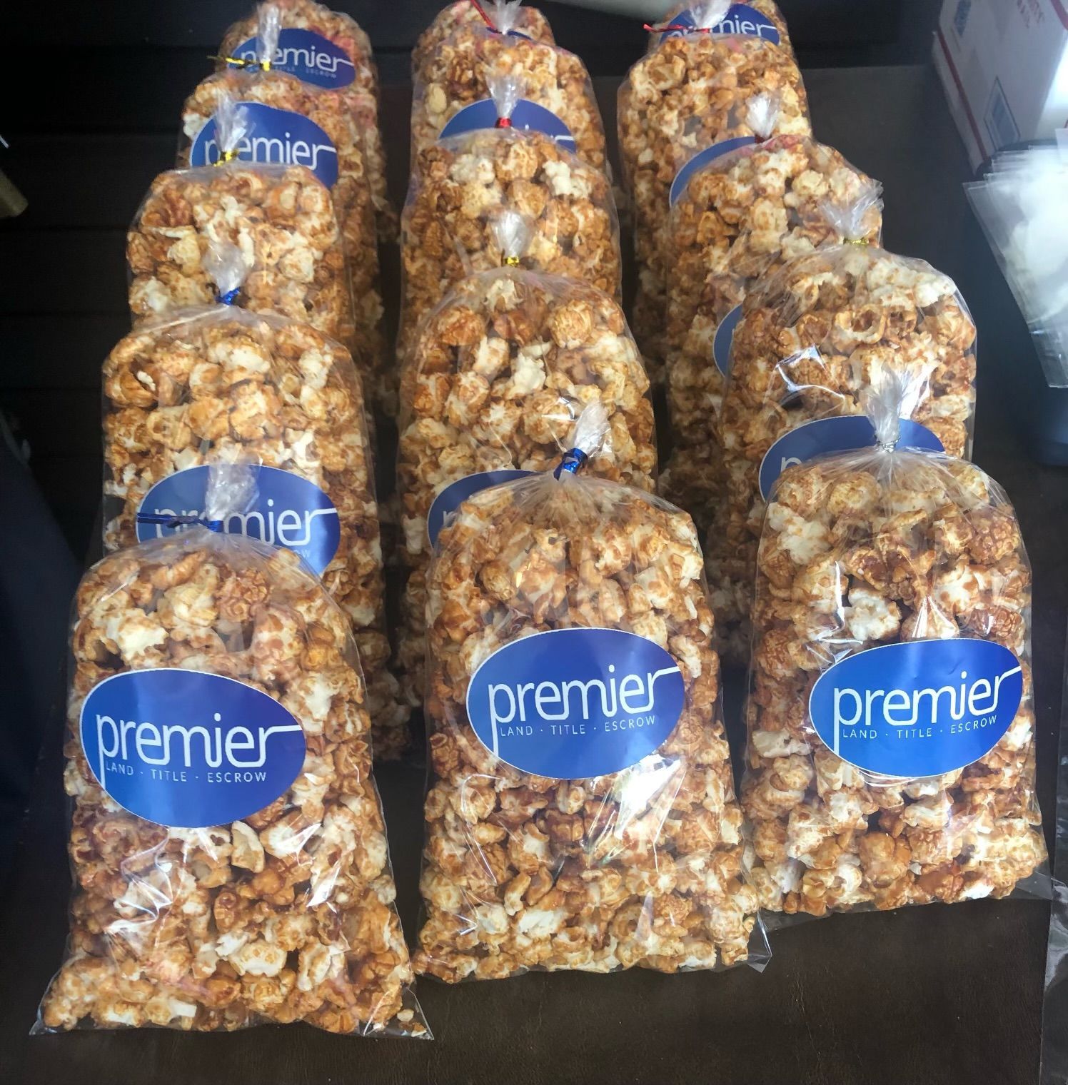 A bunch of bags of popcorn with the word premier on them