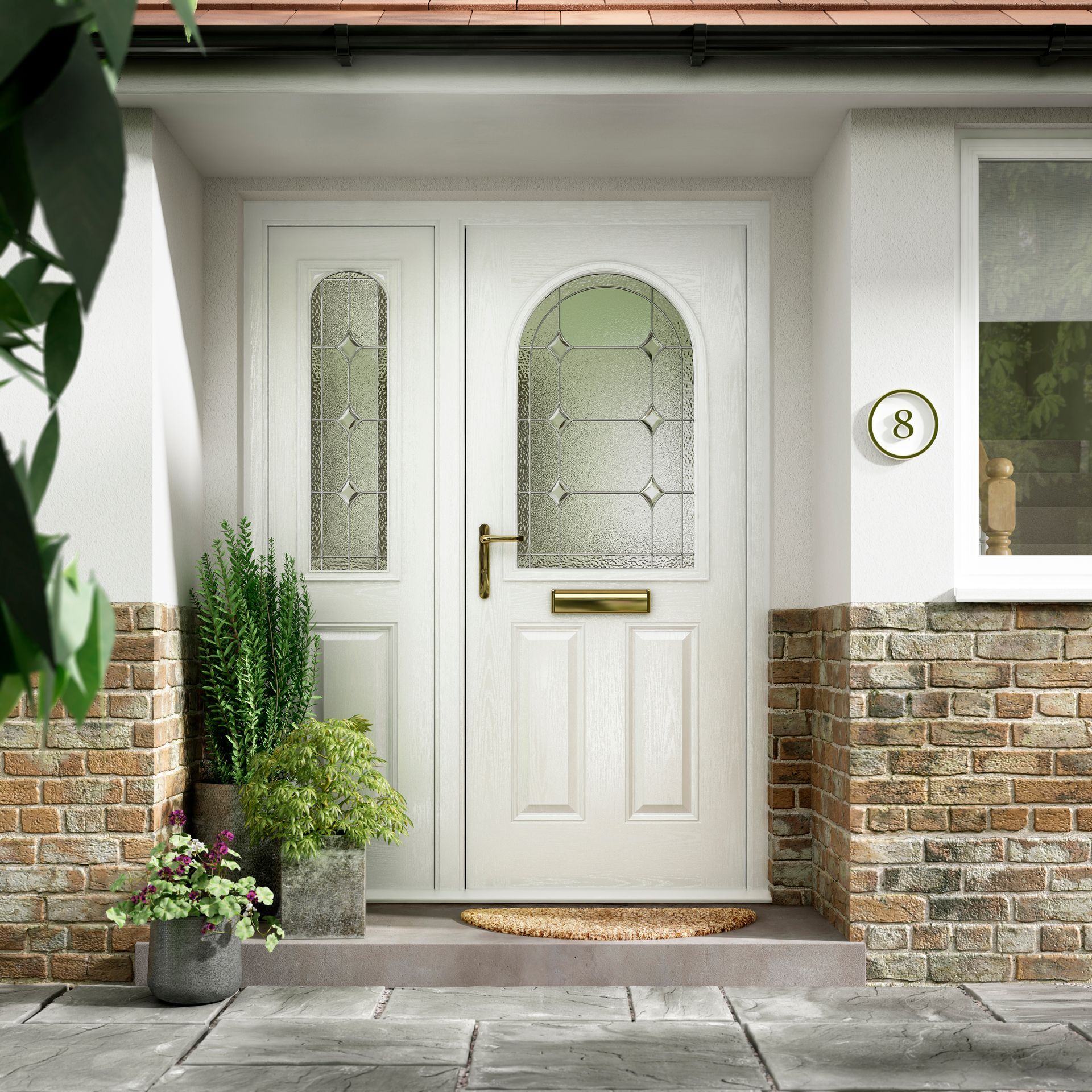 White composite front door with decorative glazing, matching side panel and brass hardware 