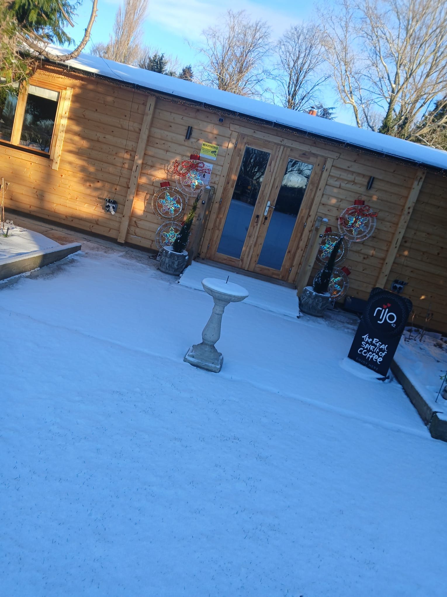 The Clubhouse Lounge at Delph Bank Touring Park covered in snow in Holbeach Lincolnshire