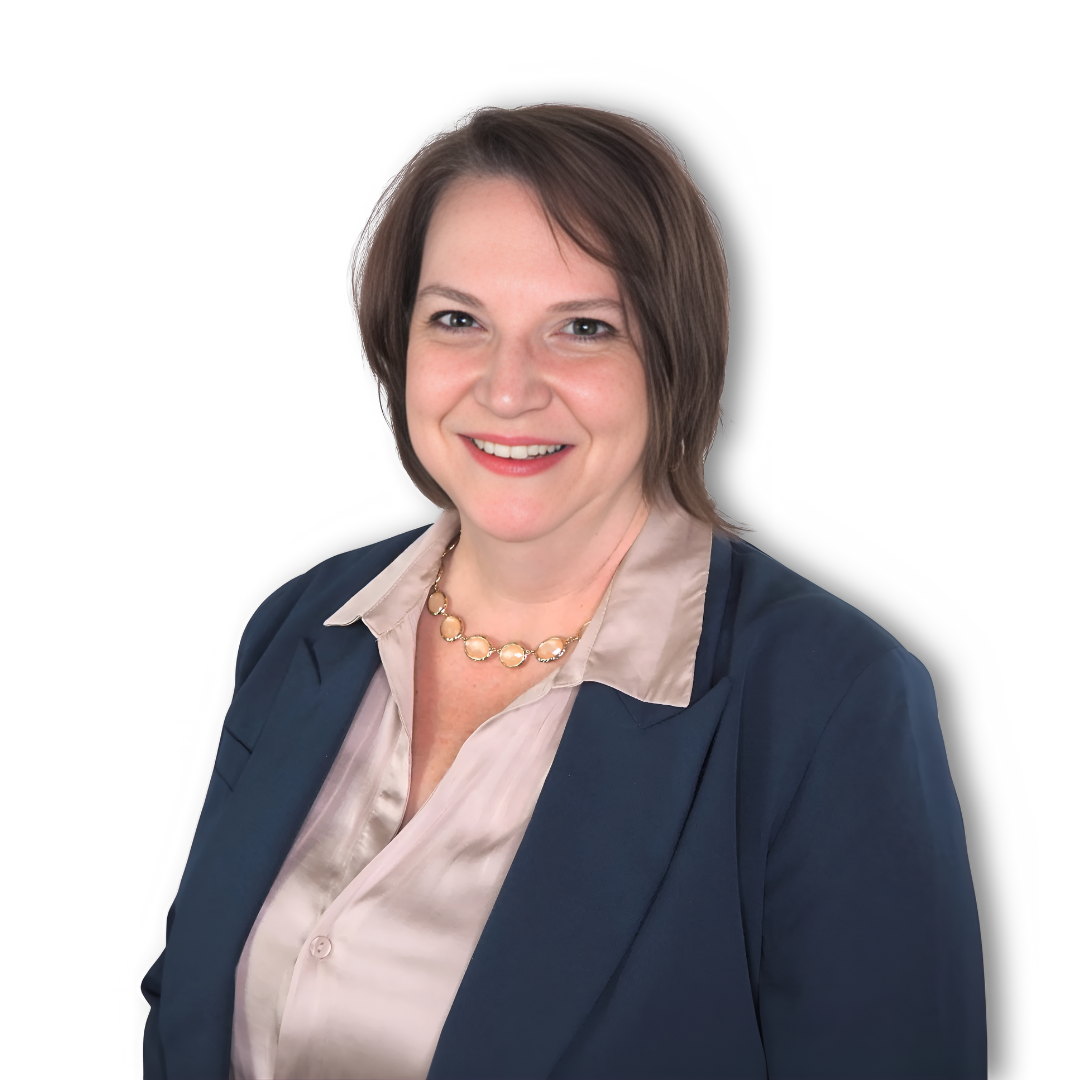 A woman wearing a blue jacket and a gold necklace smiles for the camera.